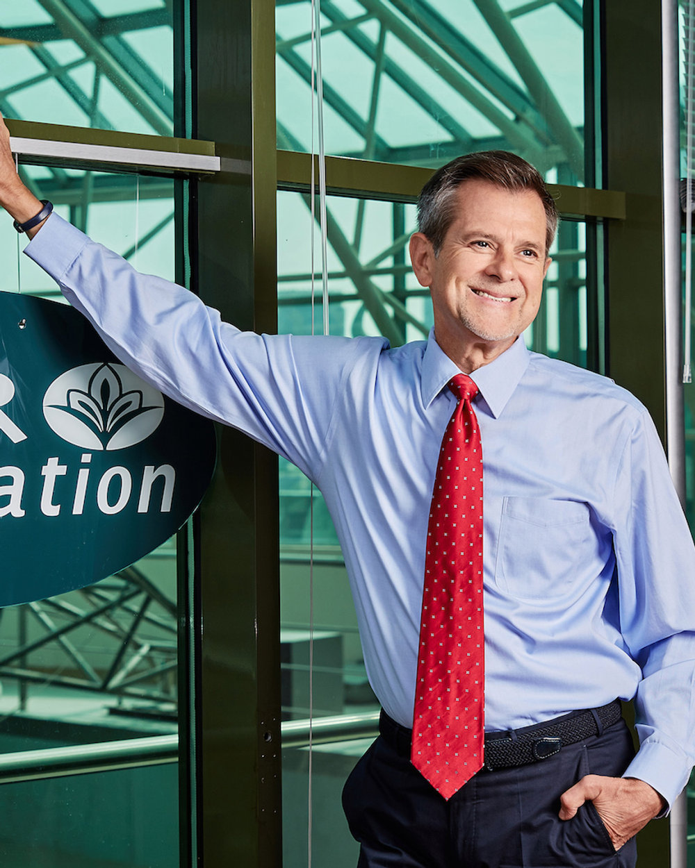 Business portrait of a company director photographed on location in his office building